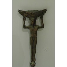 Patera handle, horned man holding wings on his head